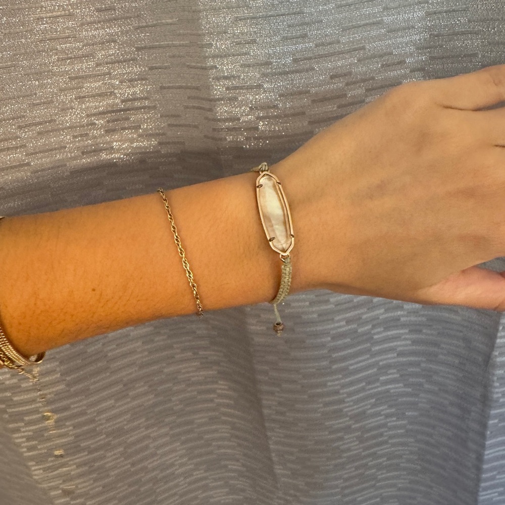 Kendra Scott Gold and Pink adjustable bracelet. Pink gem